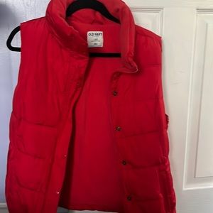 red puffer vest